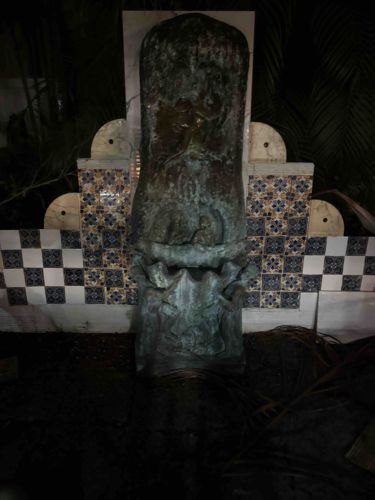 Patinated Bronze Figurative Fountain with Tiled Backdrop