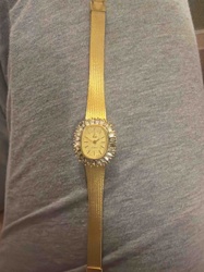 Vintage Gold Tone Ladies' Dress Watch with Baguette Diamond Halo