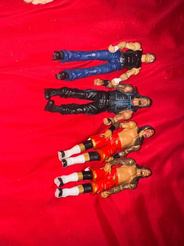 Used WWE Wrestling Action Figures (Dean Ambrose, Roman Reigns, The Usos)
