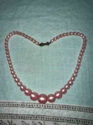 Graduated Pink Bead Necklace with Bow Clasp