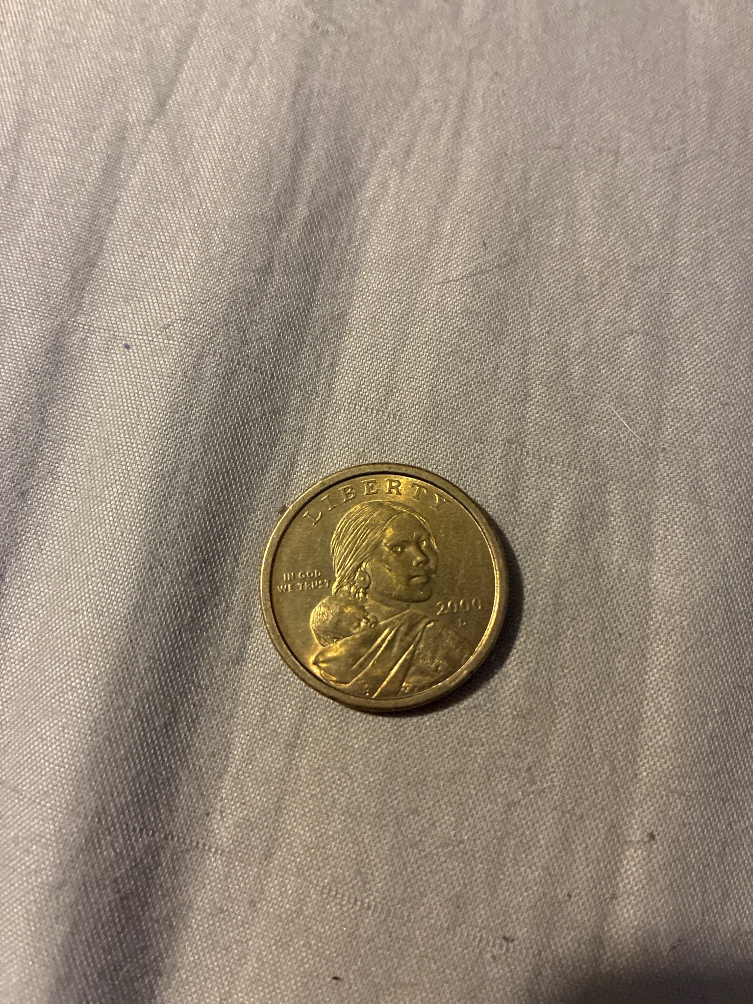 Submitted photo of Sacagawea golden dollar coin (not authenticated)