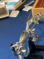Engagement Ring Mounting with Accompanying Jewelry Holder and Magnifying Glass