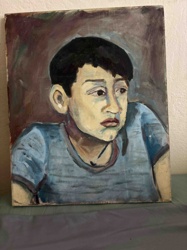 Portrait of a Boy in Blue Shirt