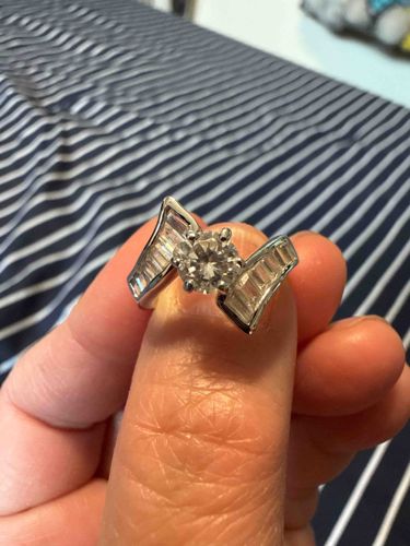 Round Brilliant and Tapered Baguette Diamond Ring