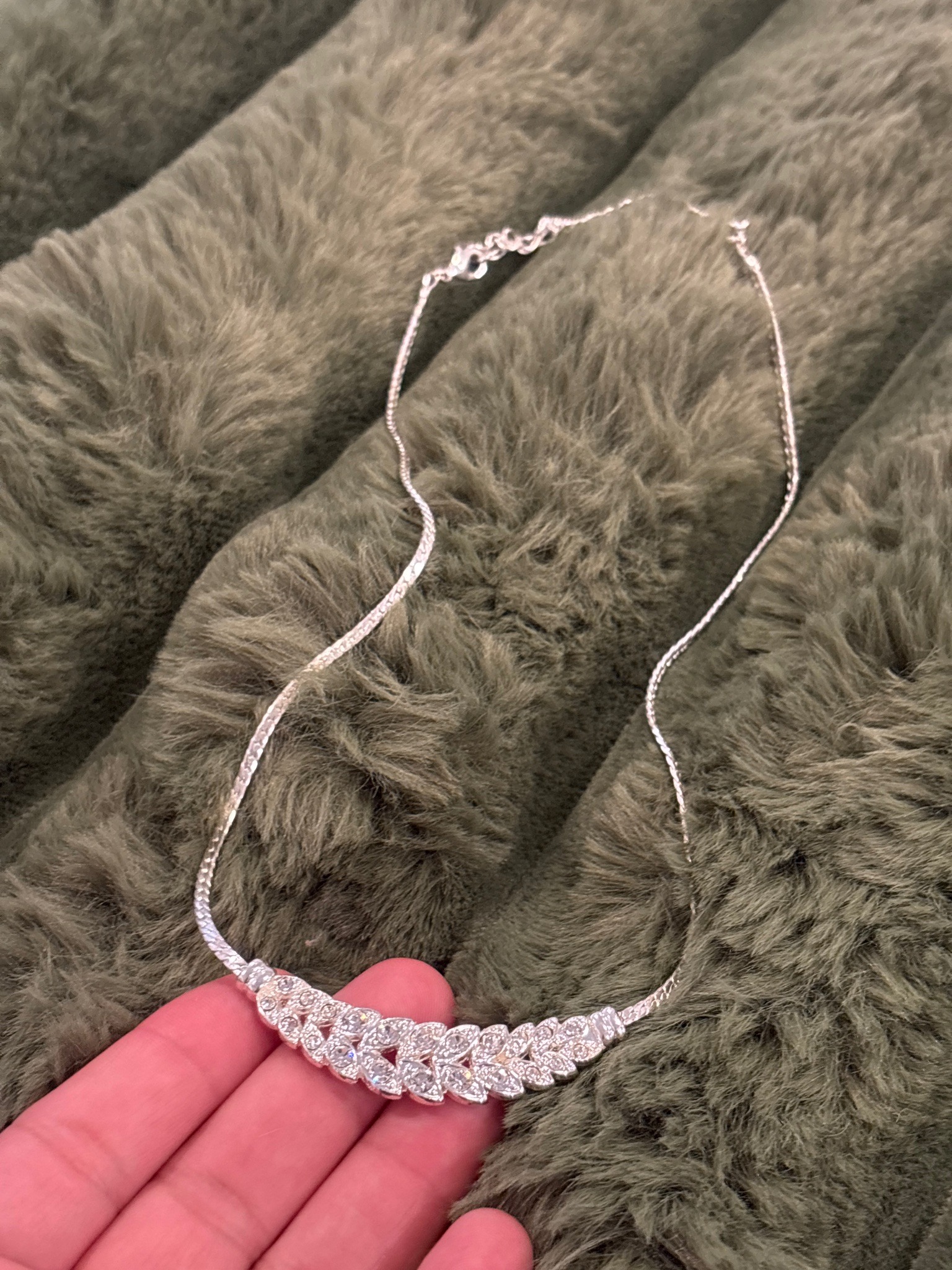 Submitted photo of Silver-tone rhinestone cluster necklace
