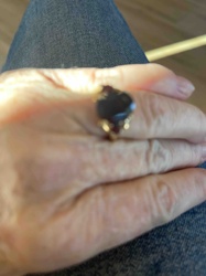 Oval Dark Gemstone Ring with Red Accents