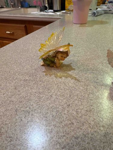 Fairy Figurine with Leaf Hat and Translucent Wings