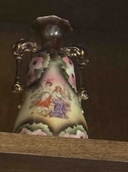 Porcelain Urn with Classical Figures and Floral Motifs