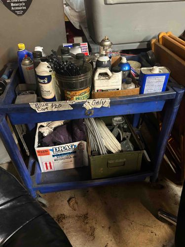 Blue Two-Tiered Utility Cart with Contents