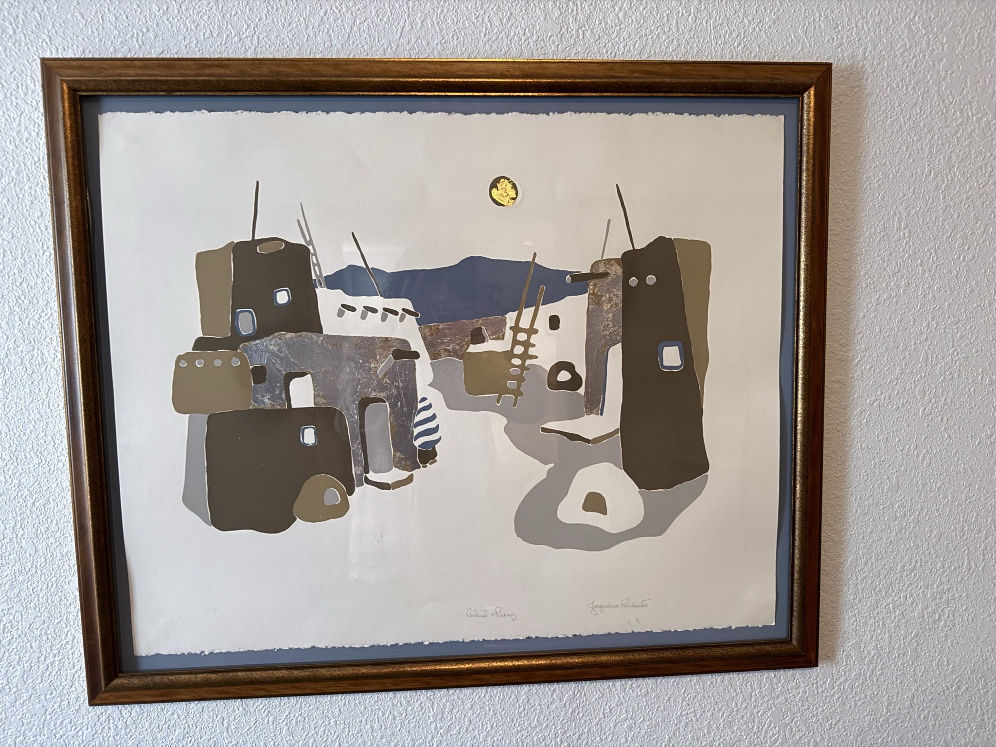 Submitted photo of Print depicting Southwestern architecture, signed 'Jacqueline Rochester'