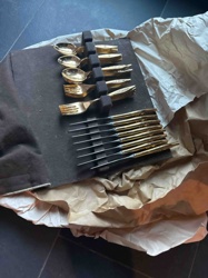 Gold-Toned Flatware Set in Storage Roll