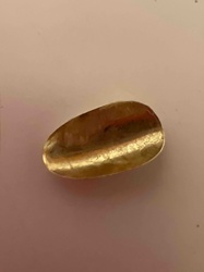 Gold-Toned Tear-Drop Shaped Object