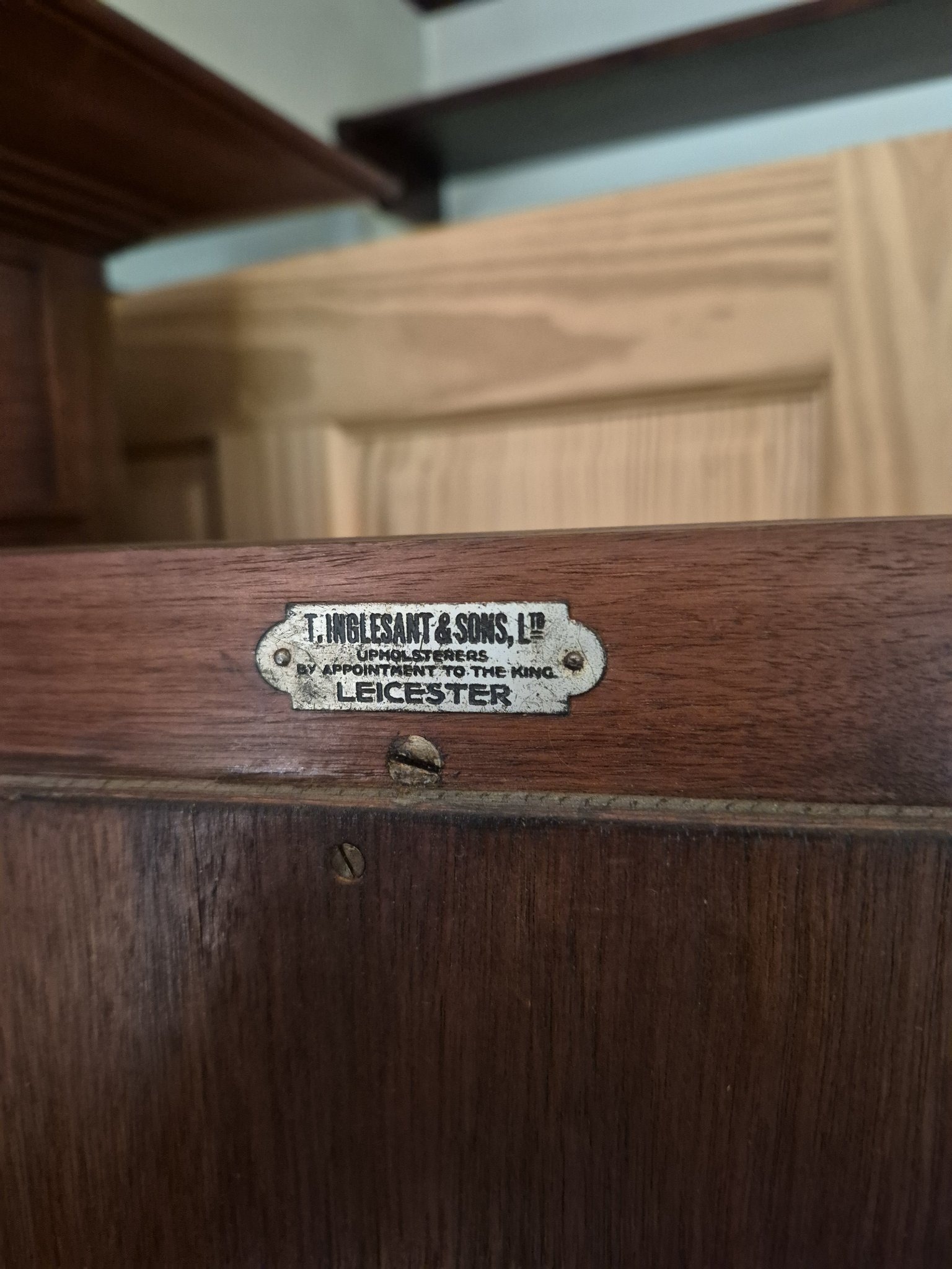 Submitted photo of Wooden furniture piece bearing a maker's plaque consistent with T. Inglesant & Sons Ltd
