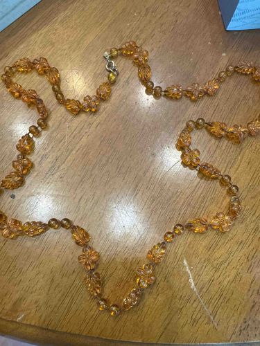 Amber-Colored Beaded Necklace with Floral and Leaf Motifs