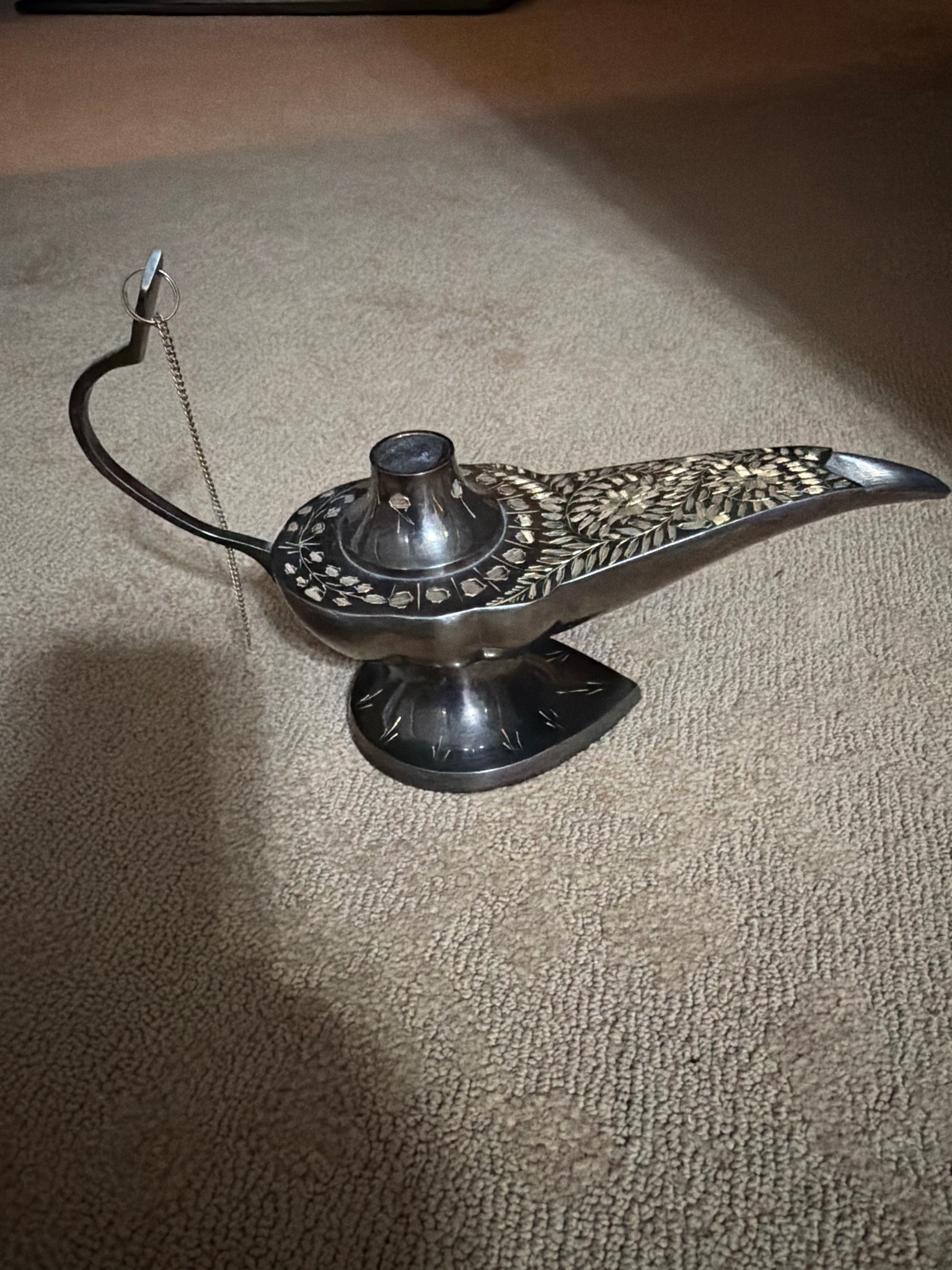 Submitted photo of Engraved metal genie lamp with chain