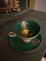 Emerald Green Gilt Porcelain Cup and Saucer Set with Figural Medallions
