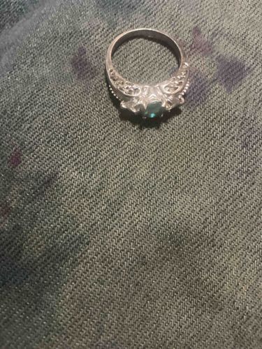 Silver-Toned Ring with Central Teal Stone and Filigree Accents
