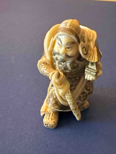 Japanese Ivory Netsuke of a Warrior or Deity with Pagoda/Lantern