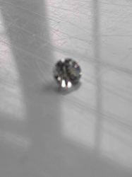 Loose Faceted Gemstone (likely Diamond)