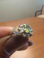 Gold Toned Ring with Green Gemstone and Diamond Accents