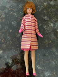 Red-Haired Barbie Doll in Striped Coat and Pink Accessories