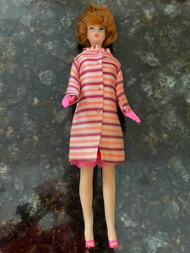 Red-Haired Barbie Doll in Striped Coat and Pink Accessories