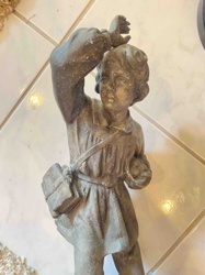 Spelter Sculpture of a Boy with Rucksack and Basket