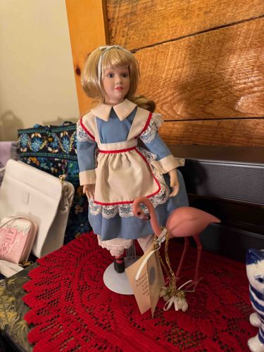 Alice in Wonderland Porcelain Doll with Flamingo Accessory