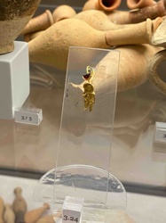 Ancient Gold Earring/Pendant with Garnet and Baby Figure