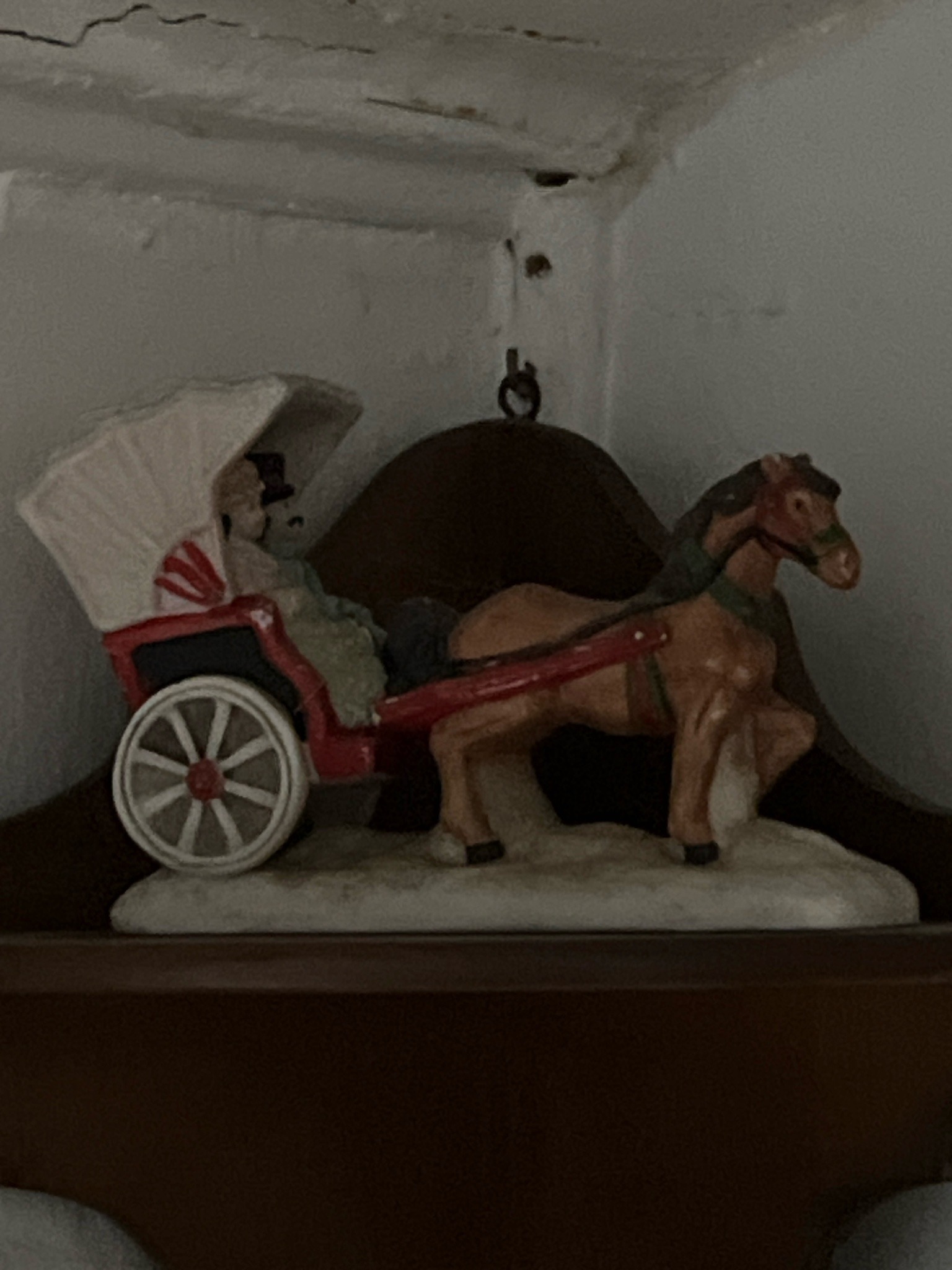 Submitted photo of Hand-painted horse-drawn carriage figurine