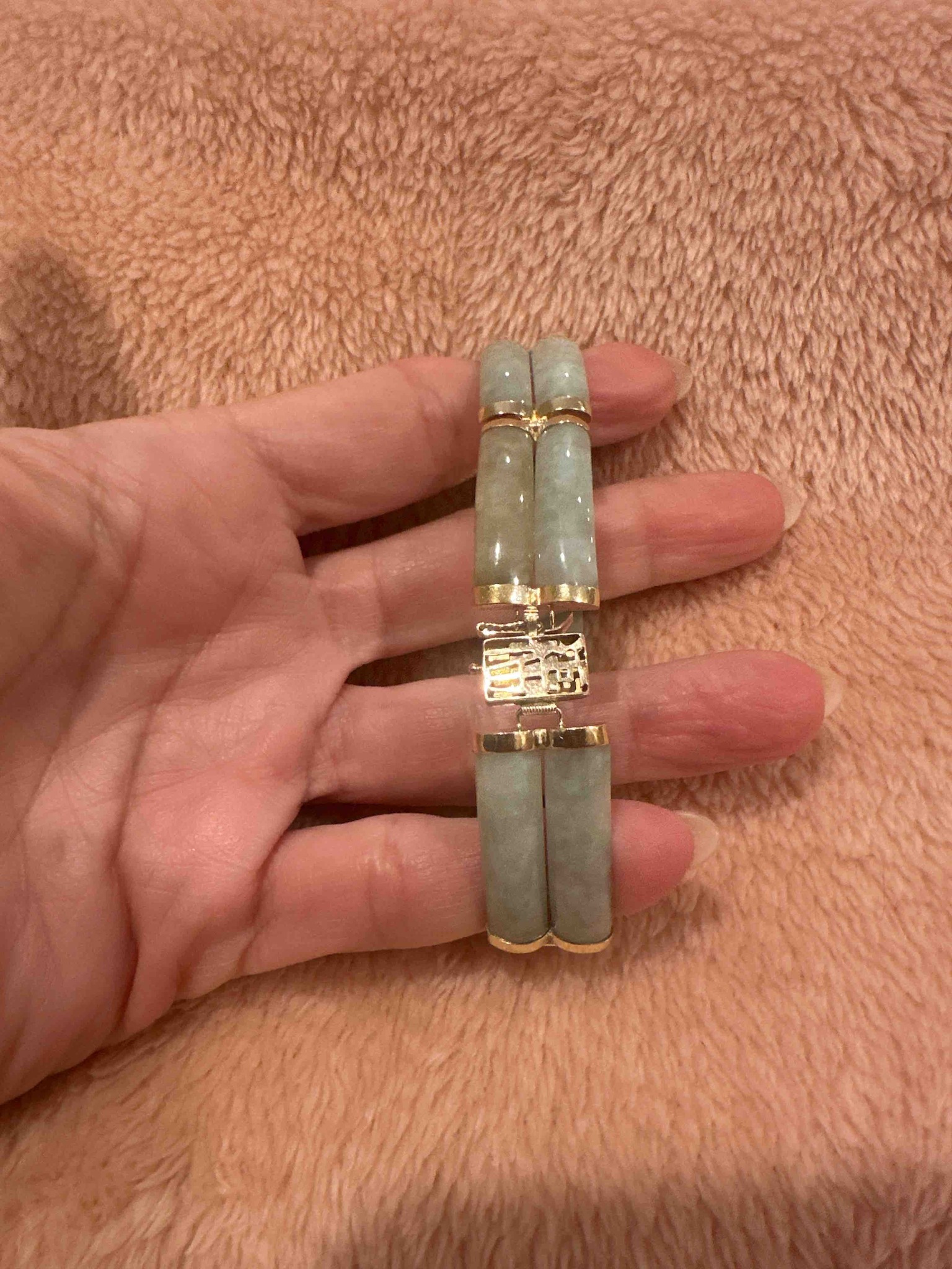 Submitted photo of Jadeite-style curved cylinder panel bracelet with yellow metal fittings
