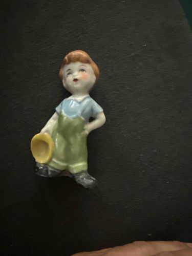 Porcelain Figurine of a Boy with a Bucket