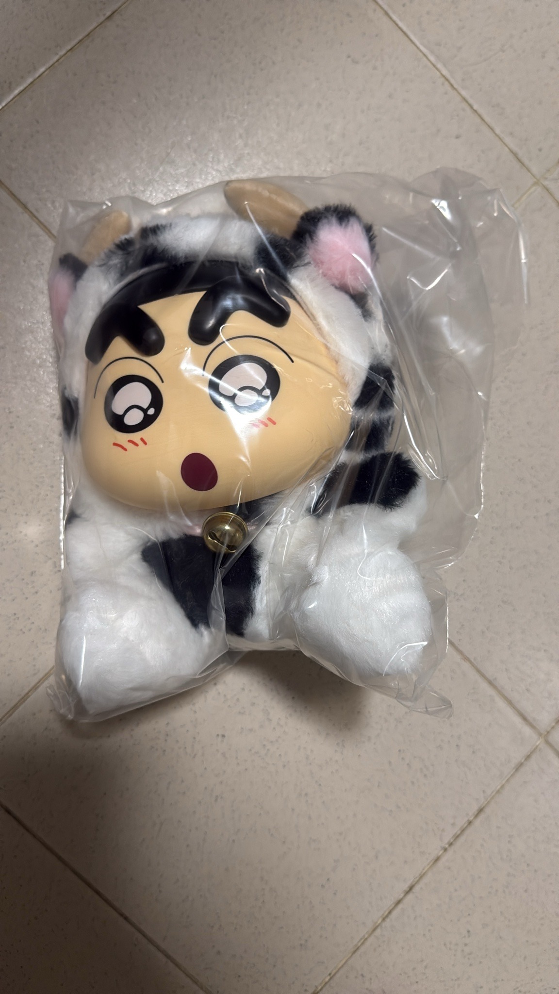 Submitted photo of Crayon Shin-chan plush toy in cow costume (not authenticated)