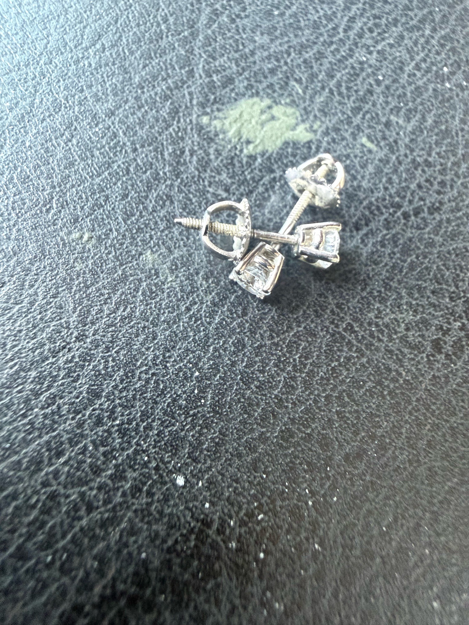 Submitted photo of Diamond Solitaire Stud Earrings (unauthenticated)