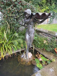 Bronze Garden Statue of a Nude Female with Clamshell Bowl