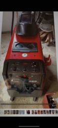 Red Portable Arc/Stick Welder with Welding Helmet