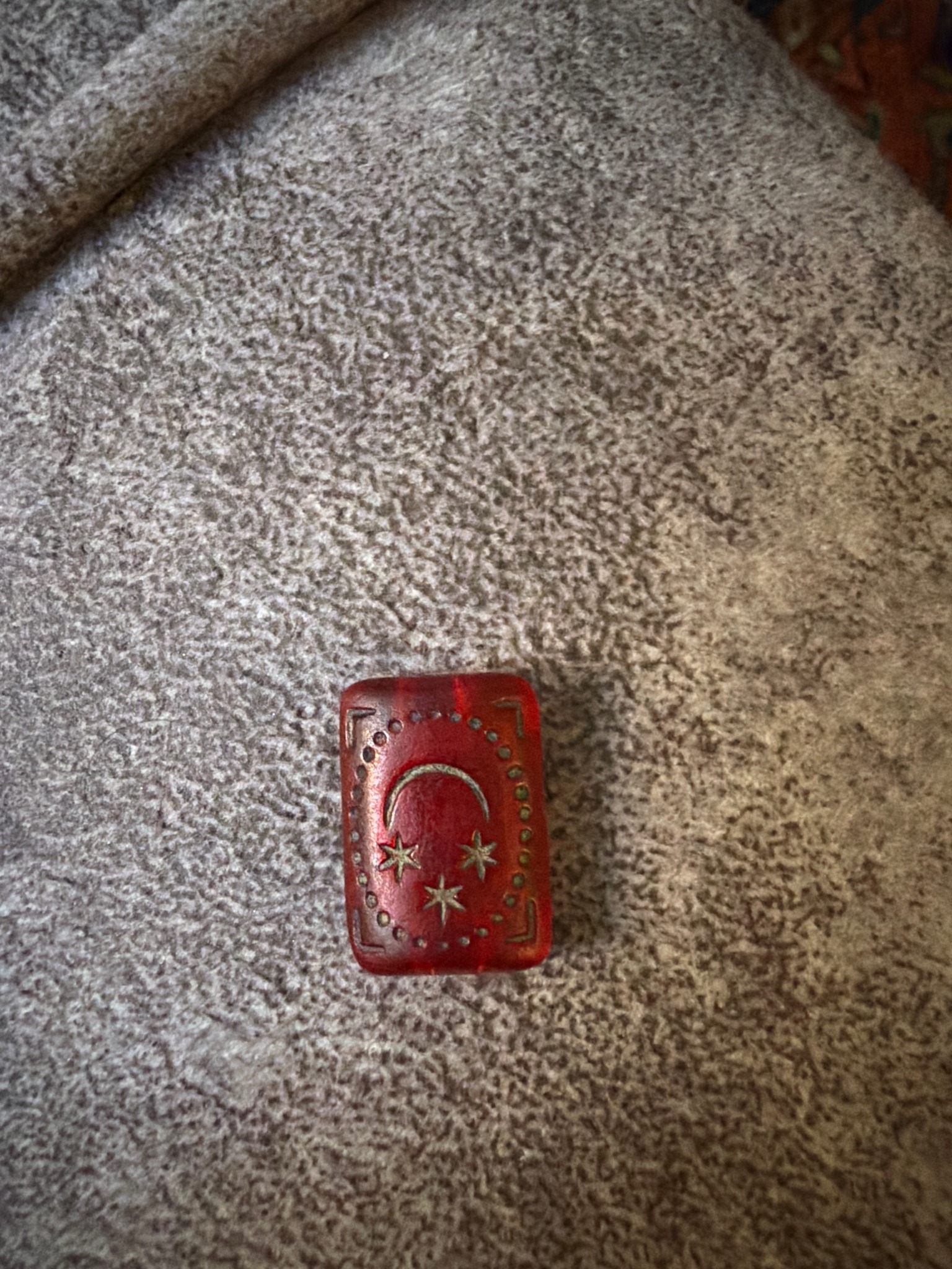 Submitted photo of Carved red bead or pendant