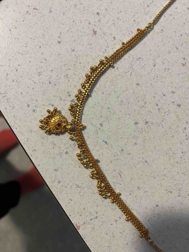 Traditional Indian Gold Necklace with Beadwork and Central Stone