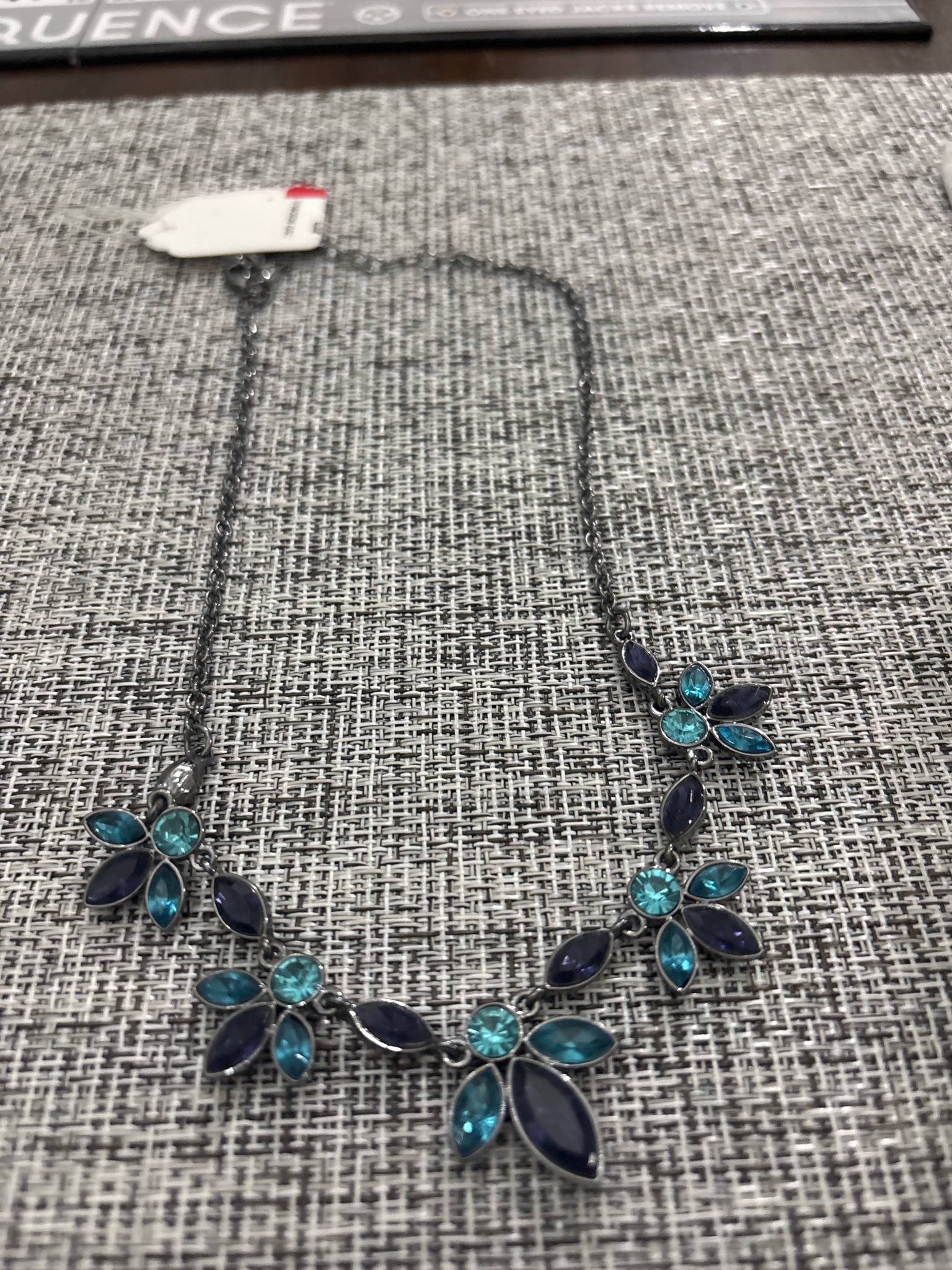 Submitted photo of Costume necklace with blue and dark purple crystal floral motifs