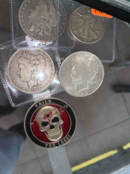 Assortment of U.S. Silver Dollars and a 'Tails You Lose' Challenge Coin