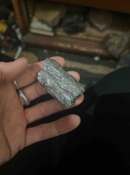 Metallic Mineral Sample (Possibly Antimony or Bismuth)