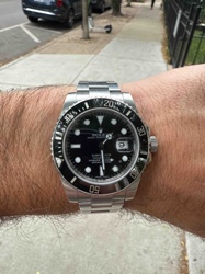 Rolex Submariner Date (Likely Reference 116610LN or 126610LN)
