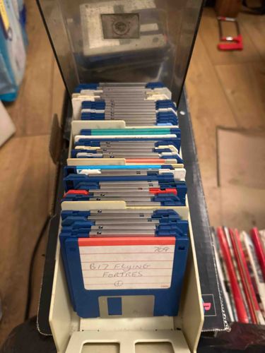 Vintage 3.5-inch Floppy Disk Storage Box with Disks