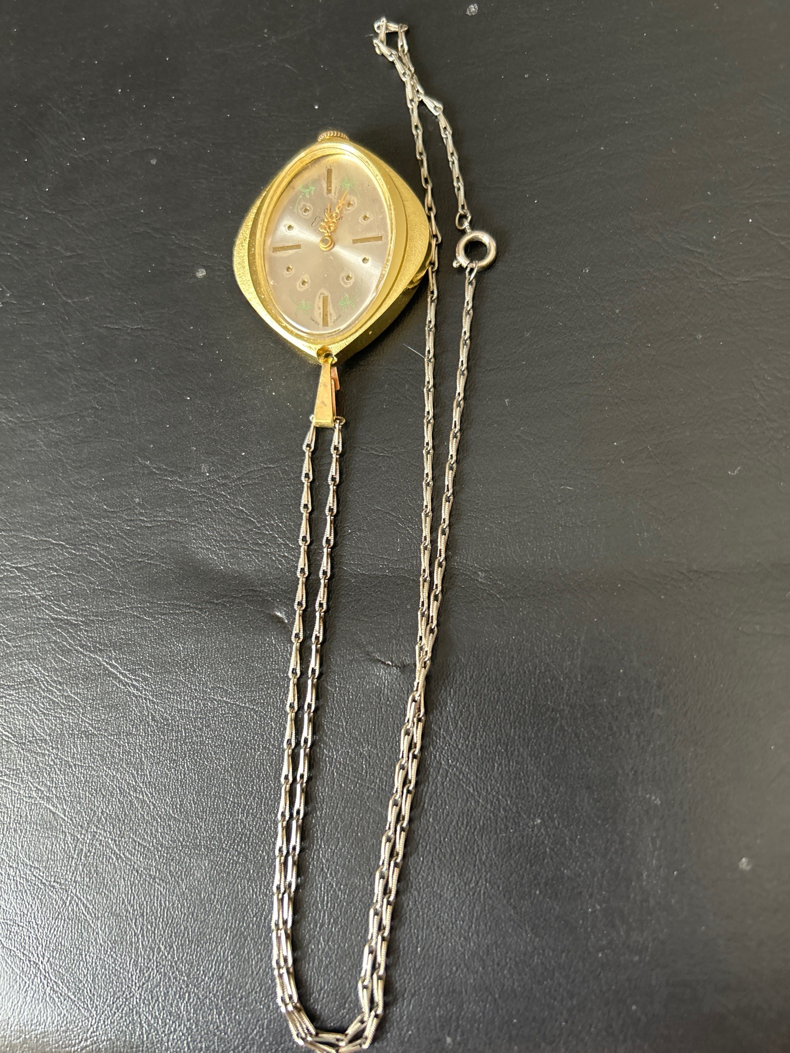 Submitted photo of Gold-tone pendant watch with chain (unauthenticated)
