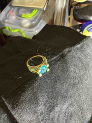 Gold-Toned Ring with Blue Topaz-like Center Stone and Aqua Accents