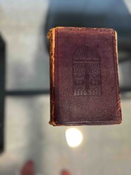 Antique Embossed Leather-Bound Book with Architectural Motif