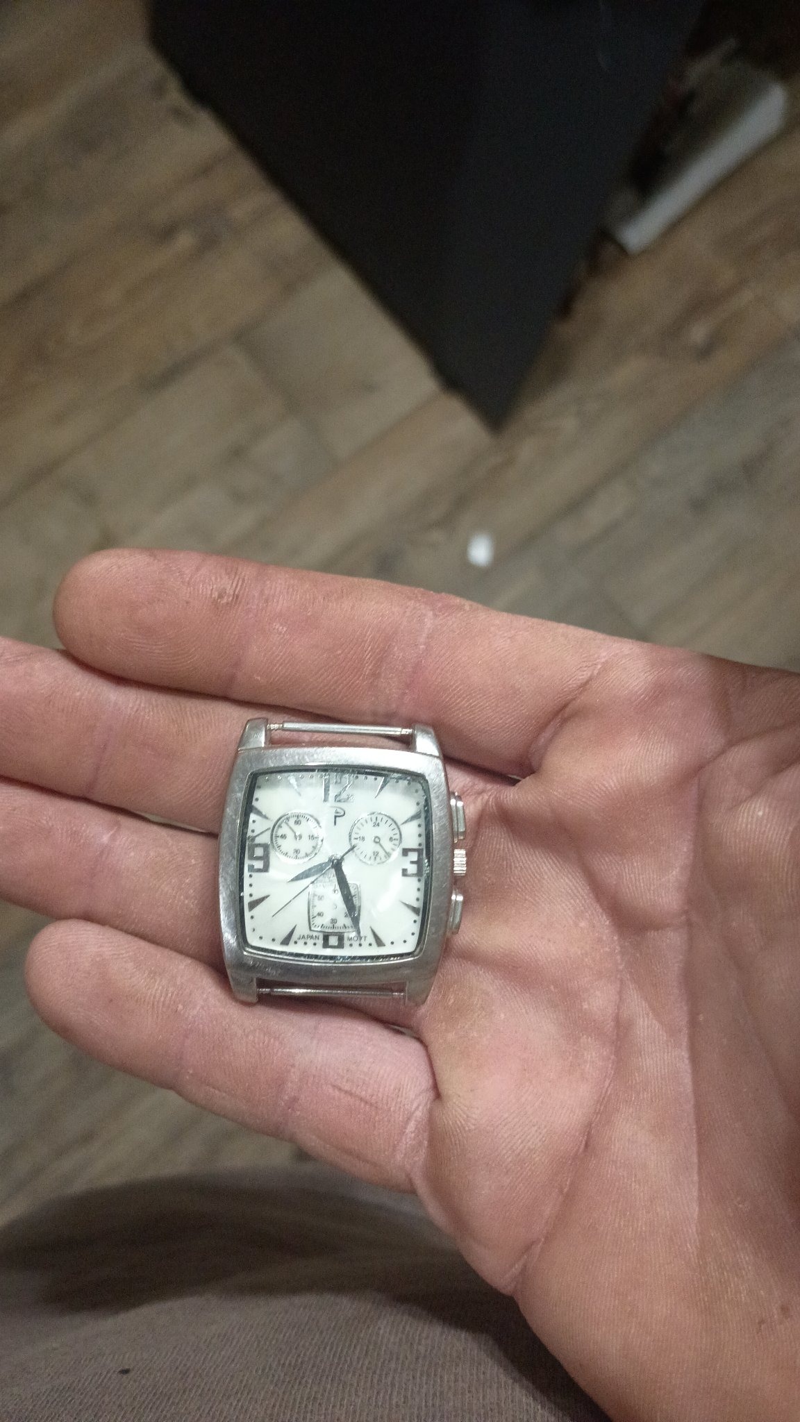 Submitted photo of Square wristwatch with chronograph dials