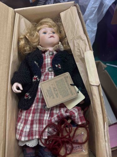 Porcelain Doll with Plaid Dress and Knitted Cardigan