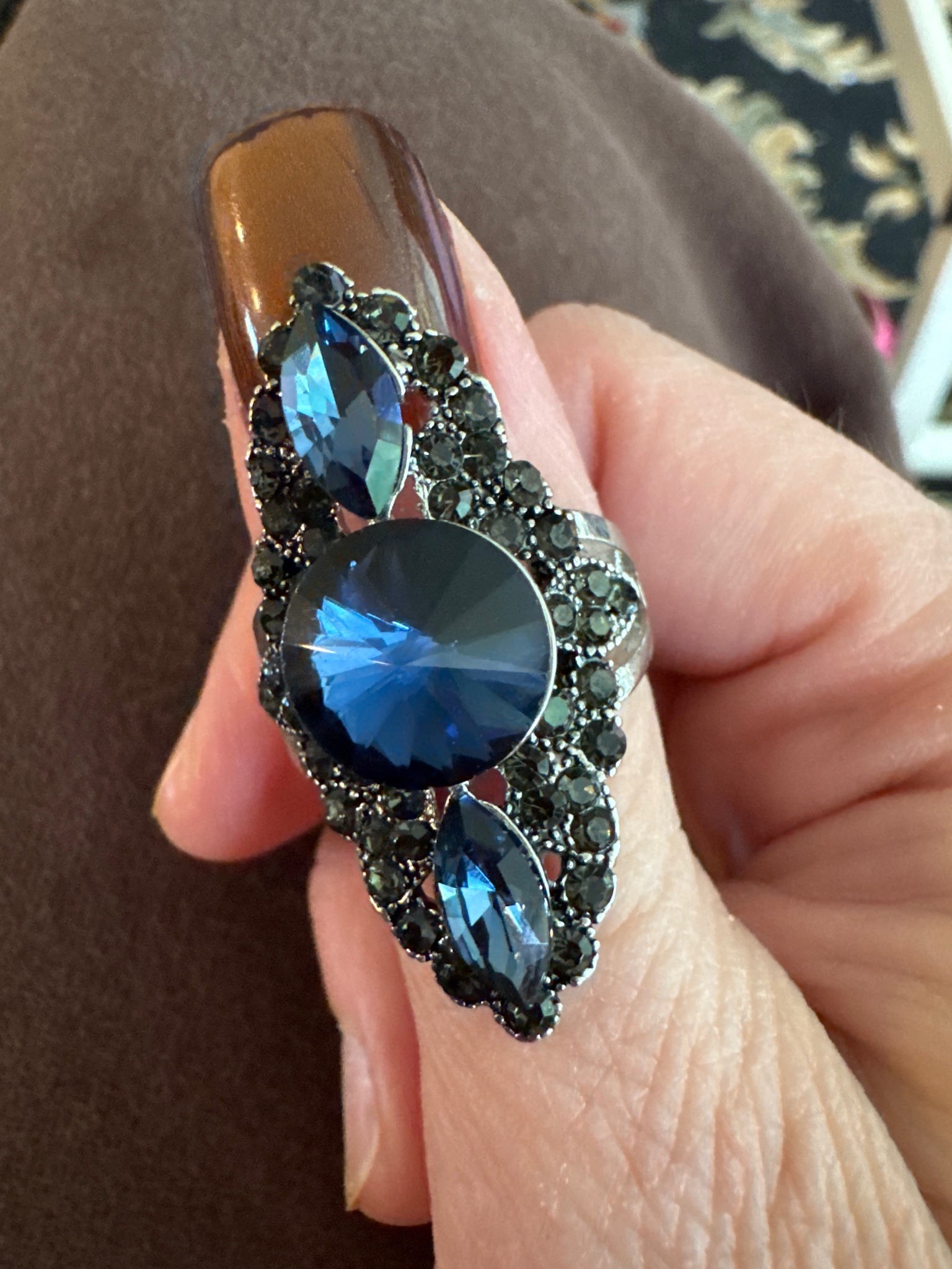 Submitted photo of Costume cocktail ring with blue and dark rhinestones