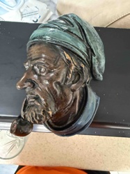 Relief Plaque of Bearded Man with Pipe
